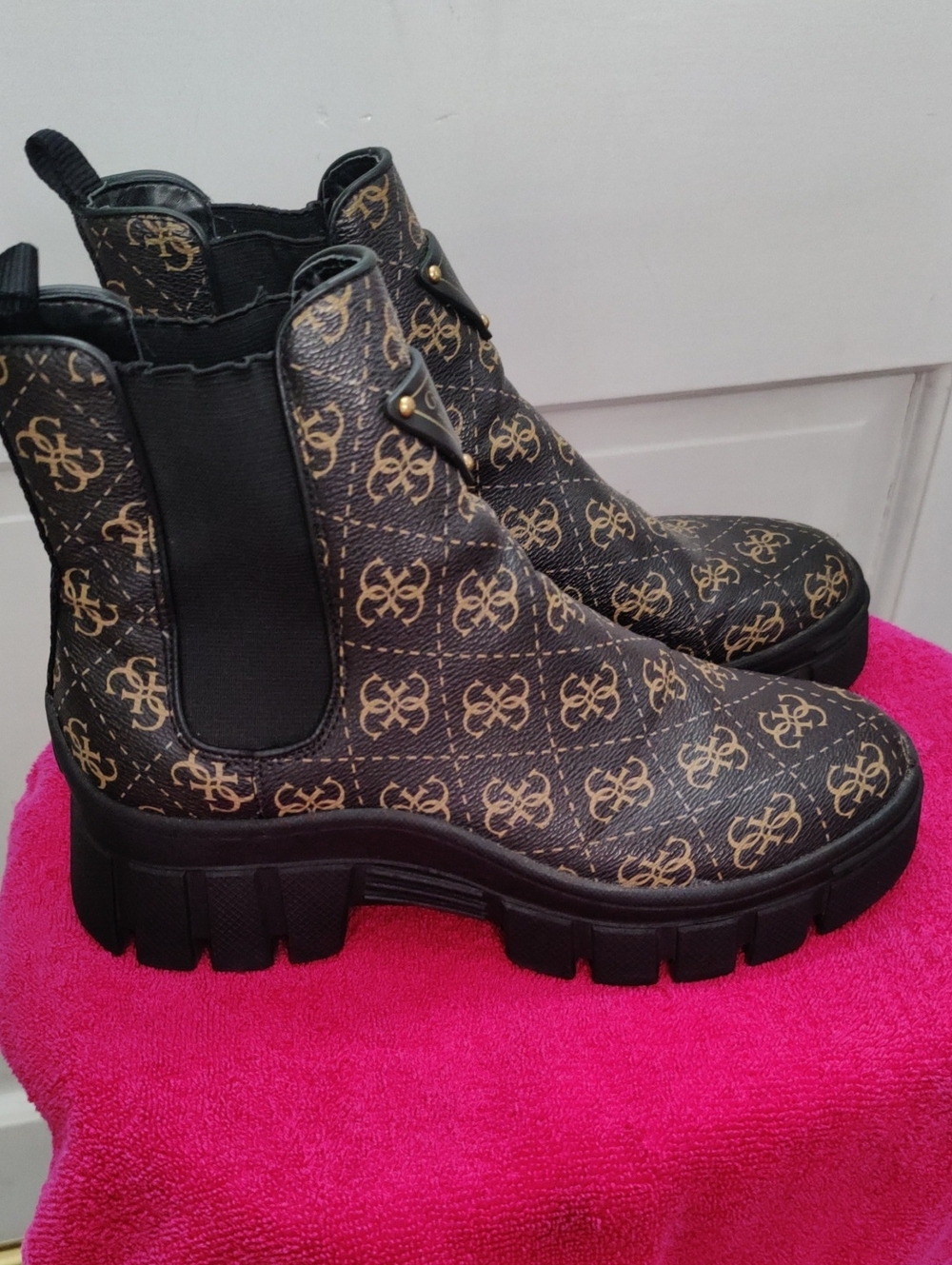 G by Guess Black and Gold Logo Chelsea Lug Boots